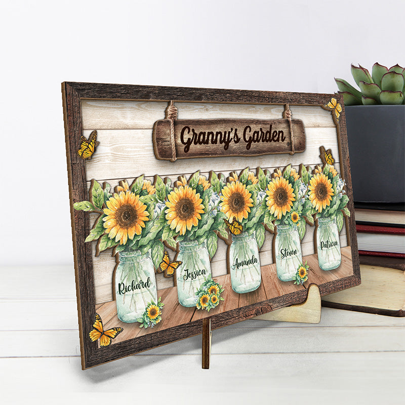 Opsferent A Garden Of Love - Family Personalized Custom 2-Layered Wooden Plaque With Stand - House Warming Gift For Grandma